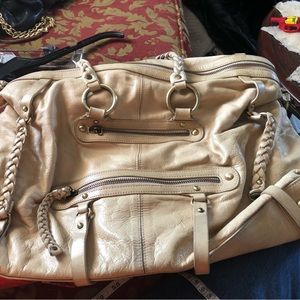 Purse, soft gold tone.  Oversized